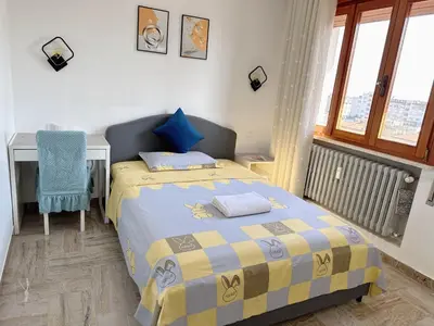 Letto o letti in una camera di Venice mestre sweet home