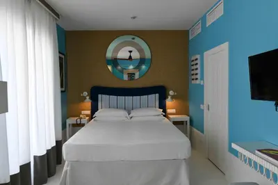 Letto o letti in una camera di Hotel Majestic