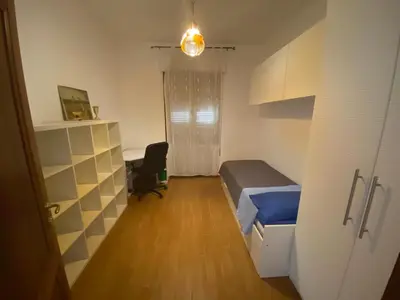 Letto o letti in una camera di Casa Tranquilla vicino al Centro