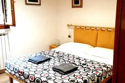 Letto o letti in una camera di Fulvio Casa