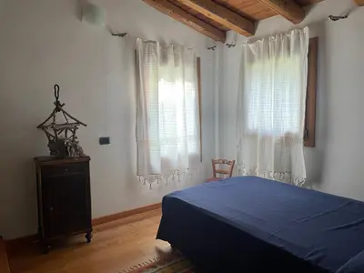 Letto o letti in una camera di Vite in Rosa La Casetta