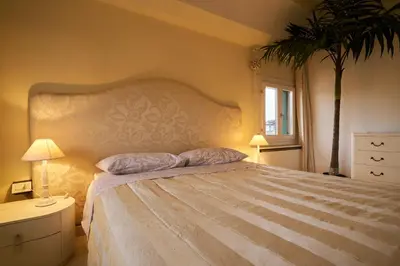 Letto o letti in una camera di Attico di Piazza Cima