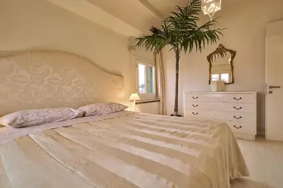 Letto o letti in una camera di Attico di Piazza Cima