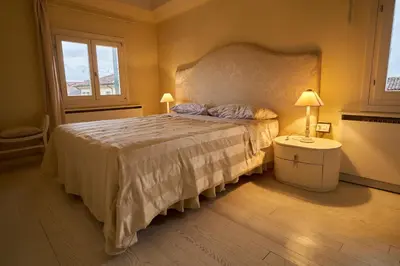 Letto o letti in una camera di Attico di Piazza Cima