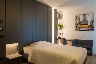 Letto o letti in una camera di Hotel Acquamatta