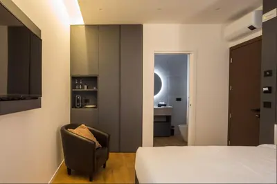 Letto o letti in una camera di Hotel Acquamatta