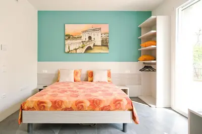 Letto o letti in una camera di Residence Diamante
