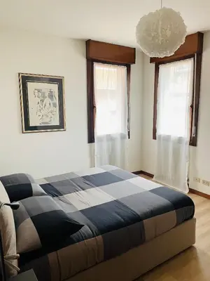 Letto o letti in una camera di Accogliente appartamento in centro