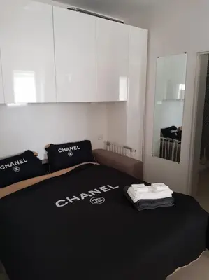 Letto o letti in una camera di Mini suite fronte mare piazza Mazzini