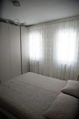Letto o letti in una camera di Casa Stella