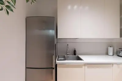 Cucina o angolo cottura di enJoy Home - Downtown Nest in Piazza Garibaldi