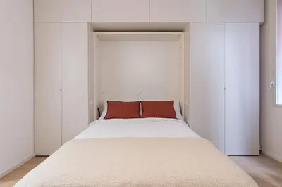 Letto o letti in una camera di enJoy Home - Downtown Nest in Piazza Garibaldi