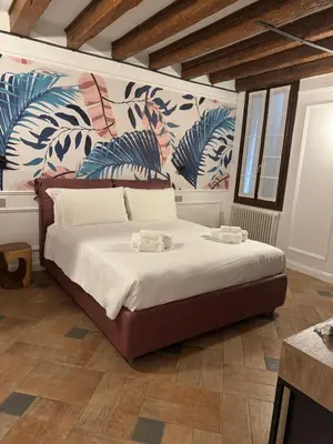 Letto o letti in una camera di Locanda Ca' Leon - Ferretti Hotels Collection