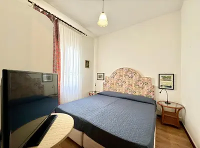 Letto o letti in una camera di Appartamenti Ca delle Rose - Carraro Immobiliare - Family Apartments