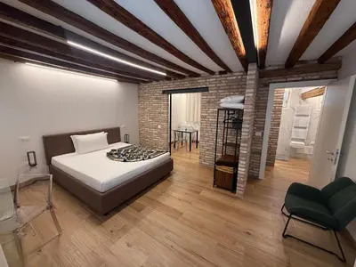 Letto o letti in una camera di Loft for couples close to the Ghetto