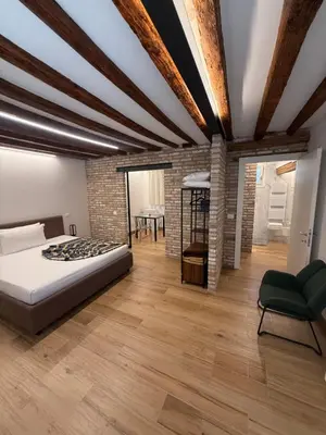 Letto o letti in una camera di Loft for couples close to the Ghetto
