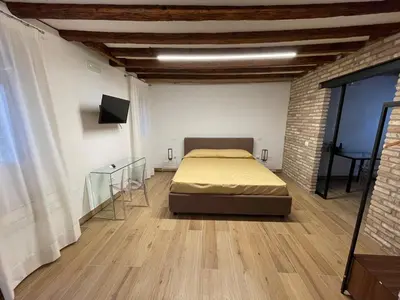 Letto o letti in una camera di Loft for couples close to the Ghetto