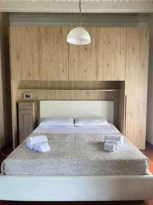 Letto o letti in una camera di Residenza Diana