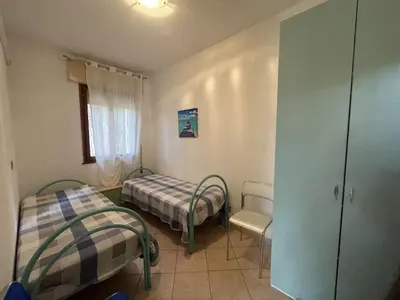 Letto o letti in una camera di Apartment Solaris-4 by Interhome