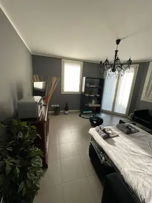 Letto o letti in una camera di ERMAN HOUSE Perla nera veneziana