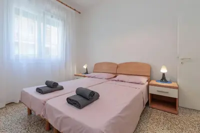 Letto o letti in una camera di Jesolo Lido Free Parking - 4 Guests - Near Beach - app 2