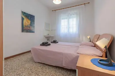 Letto o letti in una camera di Jesolo Lido Free Parking - 4 Guests - Near Beach - app 1