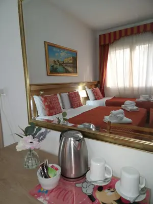 Letto o letti in una camera di Hotel Tito