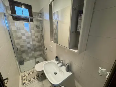 Bagno di App4rent Residence Gaia 12 - in centro, con piscina, posto auto...
