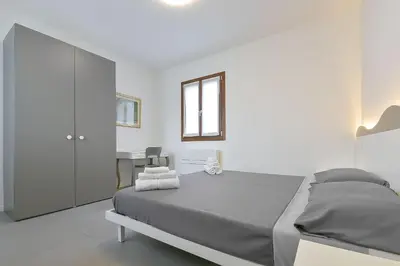 Letto o letti in una camera di Queen Venice Fly Apartments
