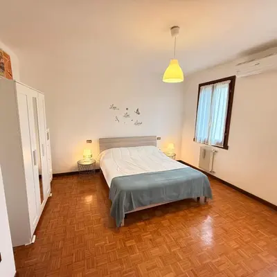 Letto o letti in una camera di Casa Paradiso