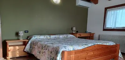 Letto o letti in una camera di Alloggio agrituristico Zambon