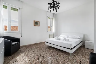 Letto o letti in una camera di Ca' Misericordia