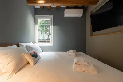 Letto o letti in una camera di Venice Jewel Canal View by Wonderful Italy