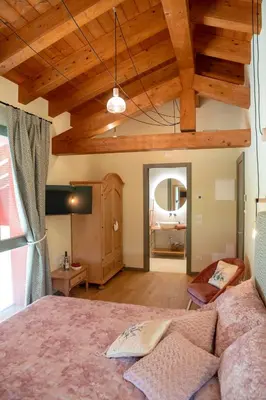 Letto o letti in una camera di Agriturismo La Rosarnetta