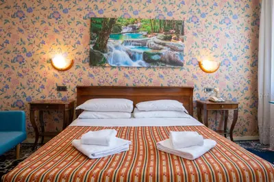 Letto o letti in una camera di Hotel alla giustizia