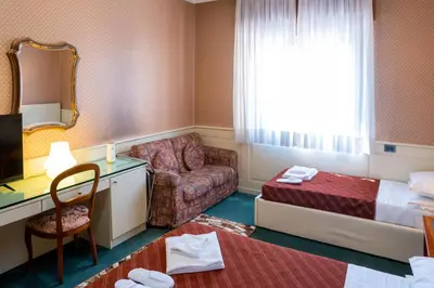 Letto o letti in una camera di Hotel alla giustizia