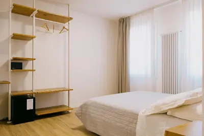 Letto o letti in una camera di B&B Ca' degli Orsi
