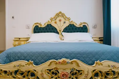 Letto o letti in una camera di B&B Ca' degli Orsi