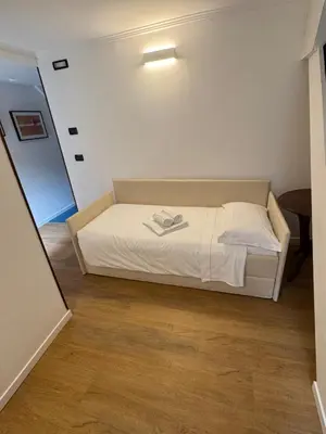Letto o letti in una camera di Alloggi Marinella