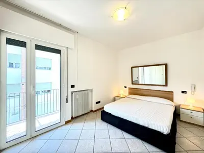 Letto o letti in una camera di Aleksandra - Carraro Immobiliare - Family Apartments