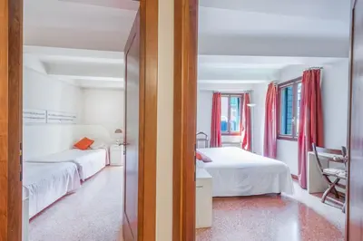 Letto o letti in una camera di Ca' de la Comare, relaxing and elegant apartment on Canal Grande