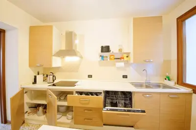 Cucina o angolo cottura di DolceVita Apartments N 519 Biennale