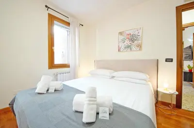 Letto o letti in una camera di DolceVita Apartments N 519 Biennale