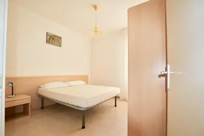 Letto o letti in una camera di Condominio Flaminia