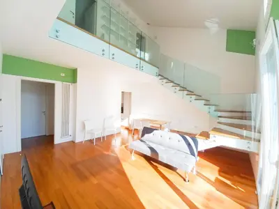 Letto o letti in una camera di Piscina - RESIDENCE ANTENORE
