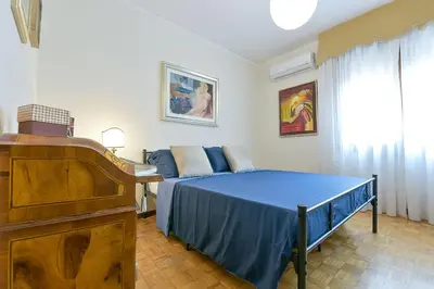 Letto o letti in una camera di QUEEN HOME Isabel