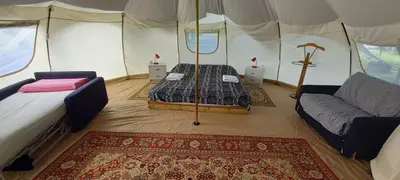 Letto o letti in una camera di terrebio Glamping