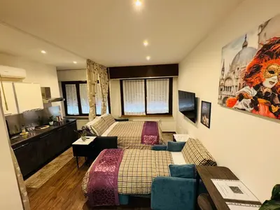 TV o dispositivi per l'intrattenimento presso Grande Bellezza Luxury Suite