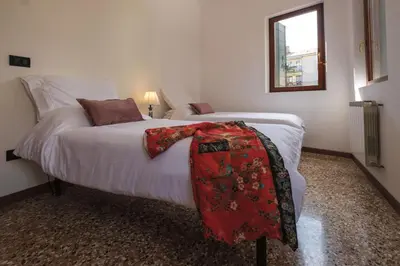 Letto o letti in una camera di Giselda Courtyard Retreat