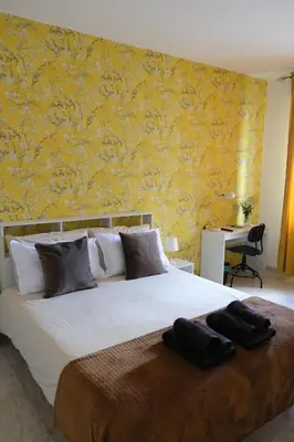 Letto o letti in una camera di Padova Art Apartments 1